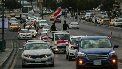مسيرة بالأعلام تجوب شوارع العراق