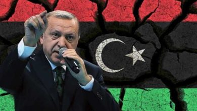 أردوغان و علم ليبيا