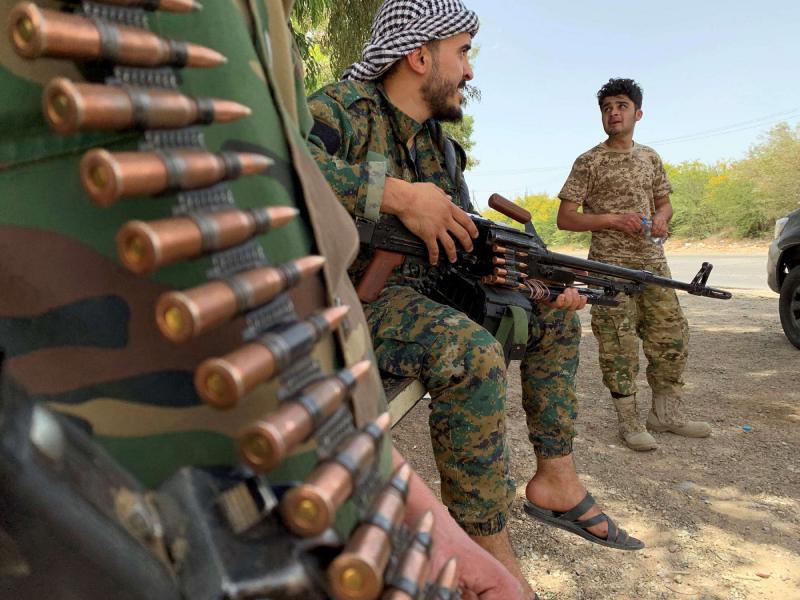 مرتزقة أردوغان السوريين في ليبيا يحملون الأسلحة